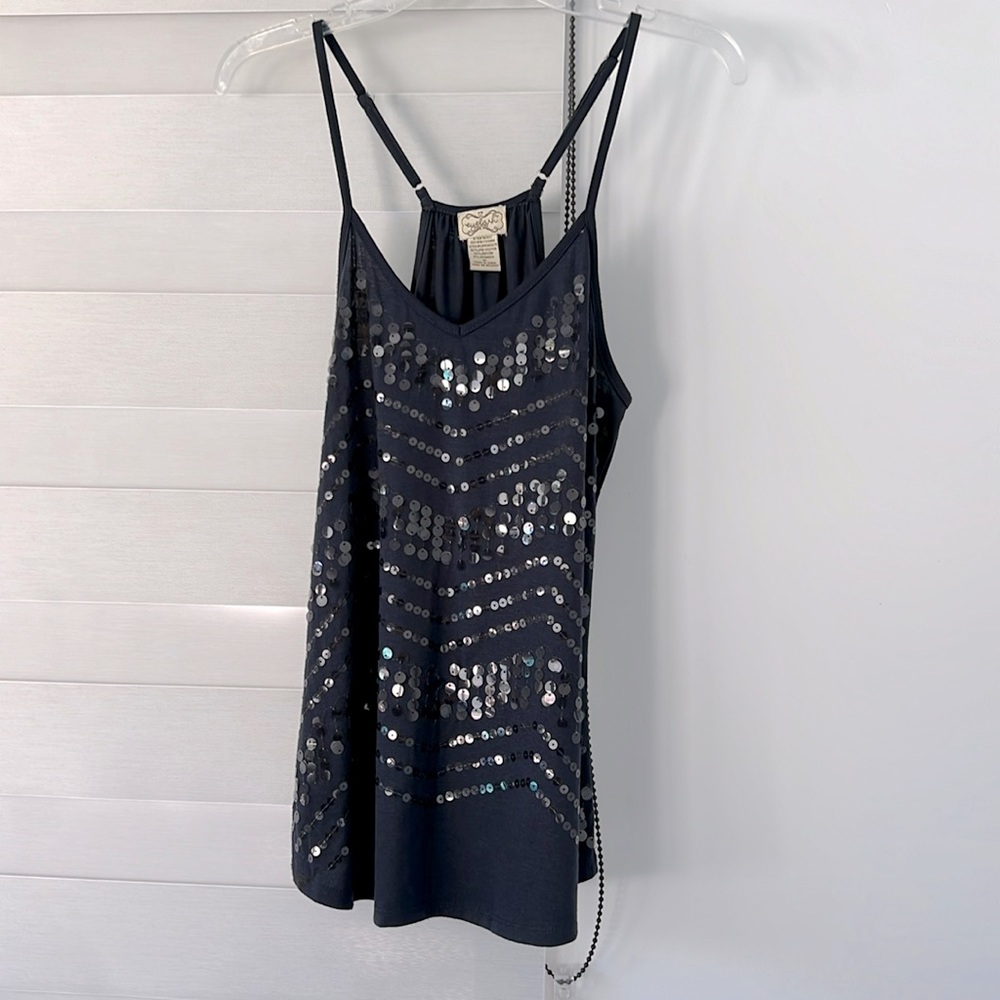 Dark gray top with round clear sequins.
